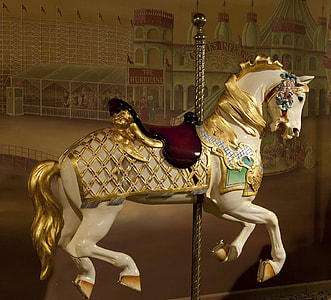 white and yellow horse carousel thumbnail