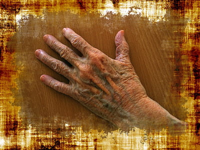 left person's hand placed on brown surface thumbnail