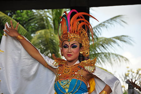 woman wearing colorful outfit with headdress thumbnail