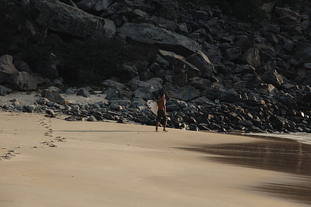 man standing on beach thumbnail