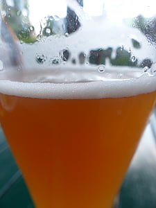 brown beverage in clear highball glass thumbnail