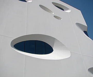low angle photography of white high-rise building thumbnail