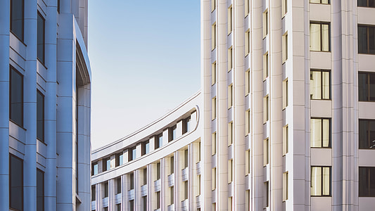 photography of white high-rise building thumbnail