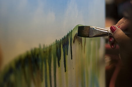 person painting on the board thumbnail