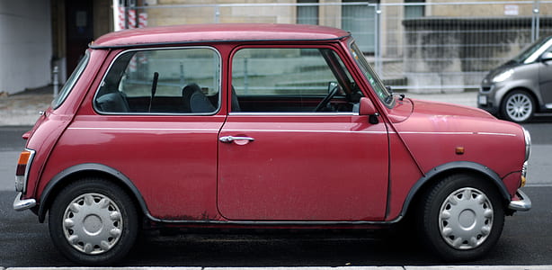red Mini Cooper parked on roadside during daytime thumbnail