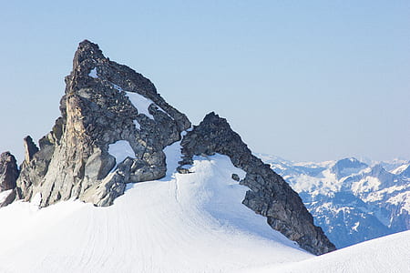 gray mountain coated by snow landscape photo thumbnail