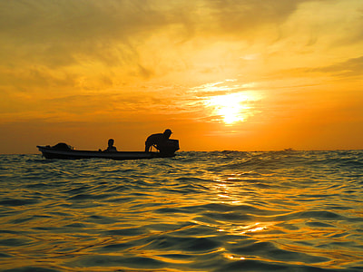 silhouette of man in boat thumbnail