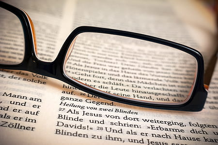 black frame eyeglasses on book top thumbnail