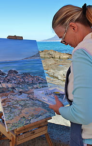 woman painting her surroundings thumbnail