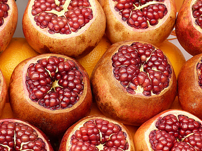 peeled red and orange seeds fruits thumbnail