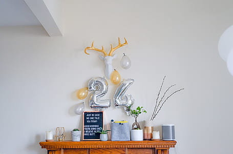 silver 24 balloon hanged on wall thumbnail