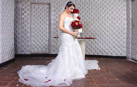 woman holding flower bouquet indoors thumbnail