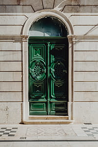 Colorful wooden door in the facade of a typical Portuguese house at Lisbon, Portugal thumbnail