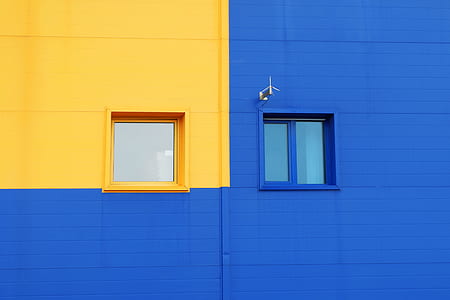 yellow and blue wooden framed glass panel windows thumbnail