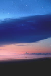 silhouette of man standing under cloudy sky thumbnail