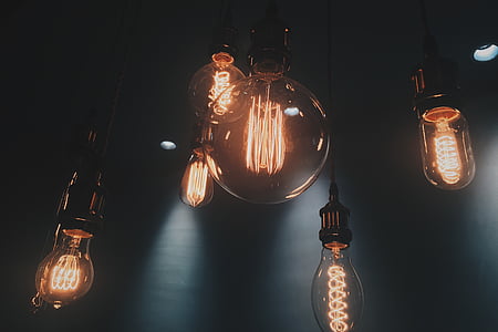 turned-on pendant lights inside dimmed room thumbnail