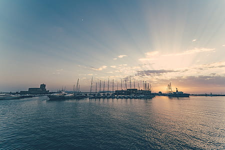 landscape photography of docked boats thumbnail