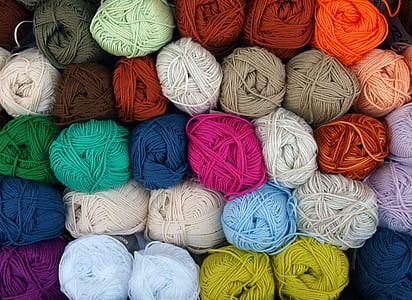 photography of piled rolled yarns thumbnail