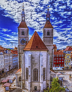 aerial view photography of church near of buildings thumbnail