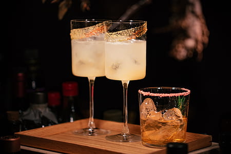 two footed glasses on table thumbnail