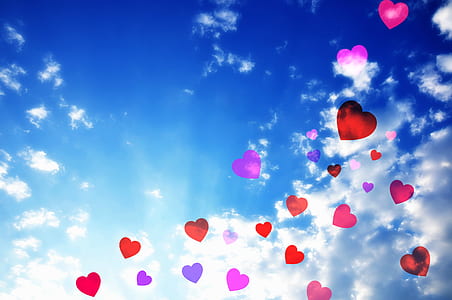 red and purple hearts illustration with white clouds background thumbnail