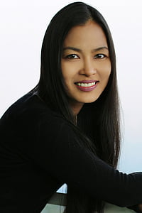 woman wearing black long-sleeved top thumbnail