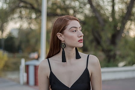 Woman Standing Outdoors thumbnail