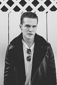 Man Wearing Black Leather Zip-up Jacket thumbnail
