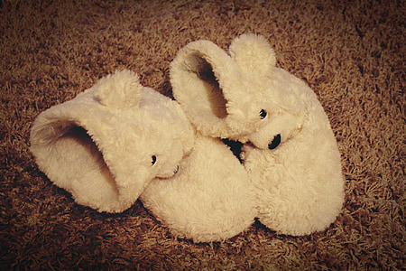 pair of white polar bear boots thumbnail