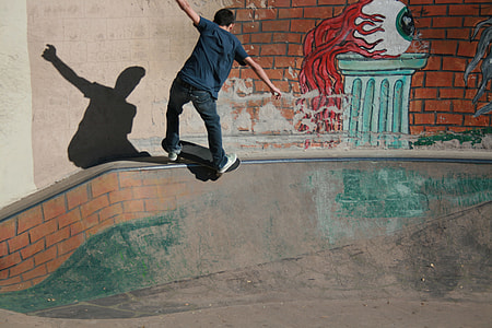 boy riding on black skateboard doing tricks thumbnail