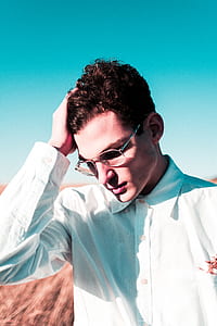 man holding his hair thumbnail