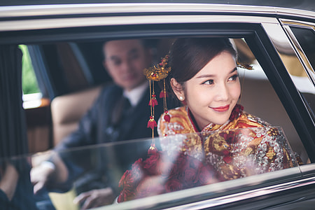 woman with traditional clothes in car thumbnail