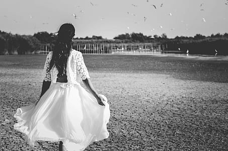 woman wearing dress during daytime thumbnail