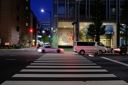 timelapse photo of a silver car on the pedestrian lane thumbnail