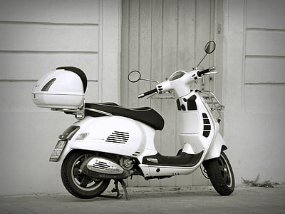 selective focus photography of white motor scooter thumbnail