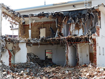 wrecked white and brown house thumbnail