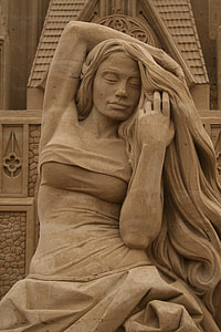 closeup photo of woman concrete statuette thumbnail