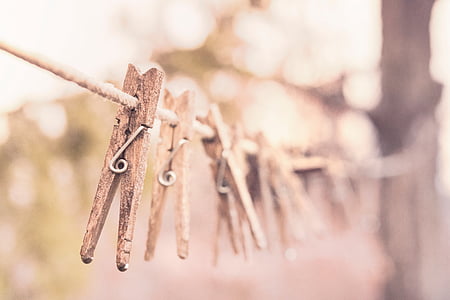 brown clothes pin close-up photo thumbnail