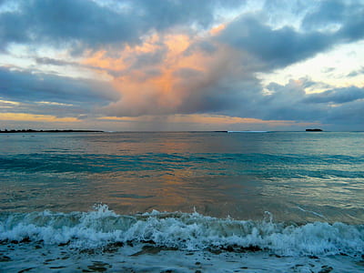 body of water during sunset thumbnail