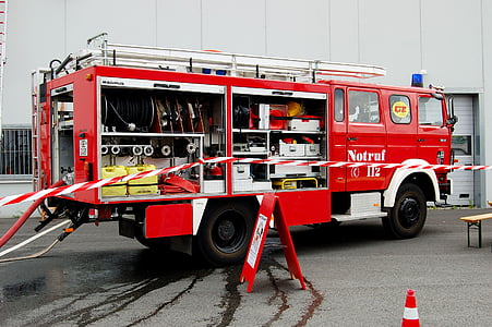 red firetruck parked on road thumbnail