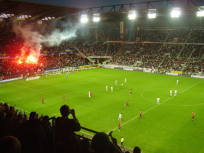 Flares of the Roazhon Celtic Kop at the Roazhon Park in Rennes, France thumbnail