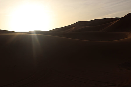 silhouette photo of desert during daytime thumbnail