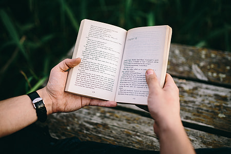 Reading book at lake thumbnail
