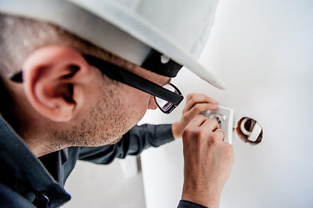 person fixing power socket thumbnail