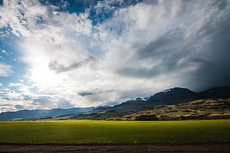 greenfield during cloudy day thumbnail