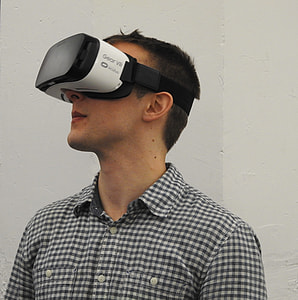 man using Samsung Gear VR goggles thumbnail