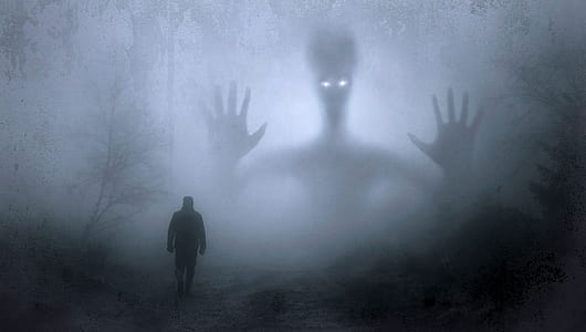 silhouette of a person with ghost and mist thumbnail