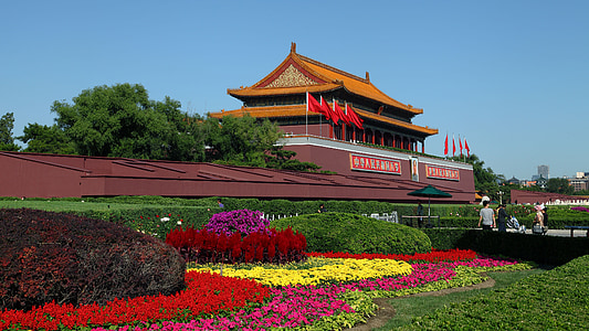 temple with flower garden during daytime thumbnail