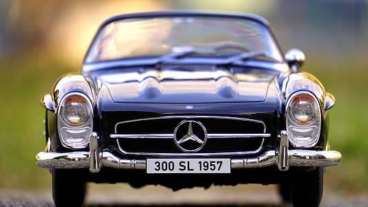 selective focus photography of blue Mercedes-Benz convertible car thumbnail