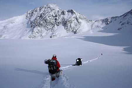 man walking on snowy ground thumbnail